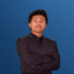 Portrait of Jangbu Sherpa, Human Resources Manager, wearing professional attire.
