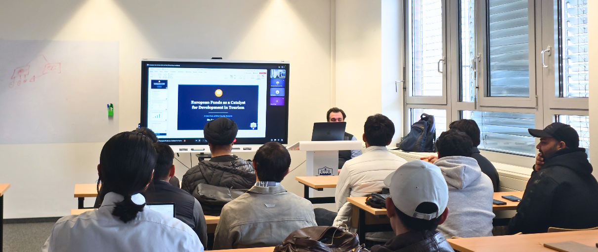 EIIET students with speaker Dr. Laurențiu Petrila after the lecture on EU funds and tourism development